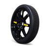 Side view of 17-inch EZ Spare Wheel with gloss black alloy finish and safety speed labels.