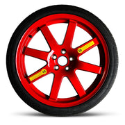 A 18" reliable spare tire for Subaru BRZ, 125/70R18 with a red wheel.